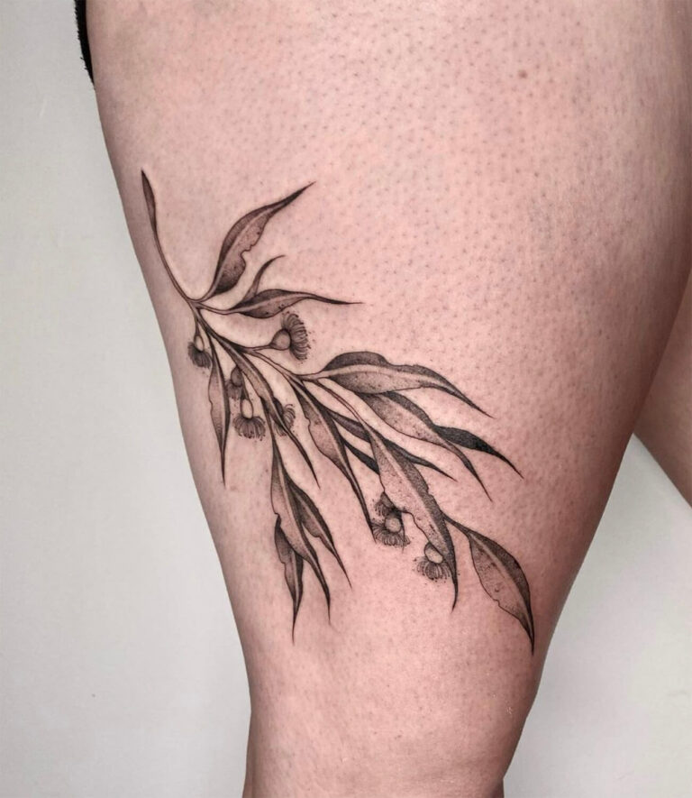 Black and grey eucalyptus leaves tattoo