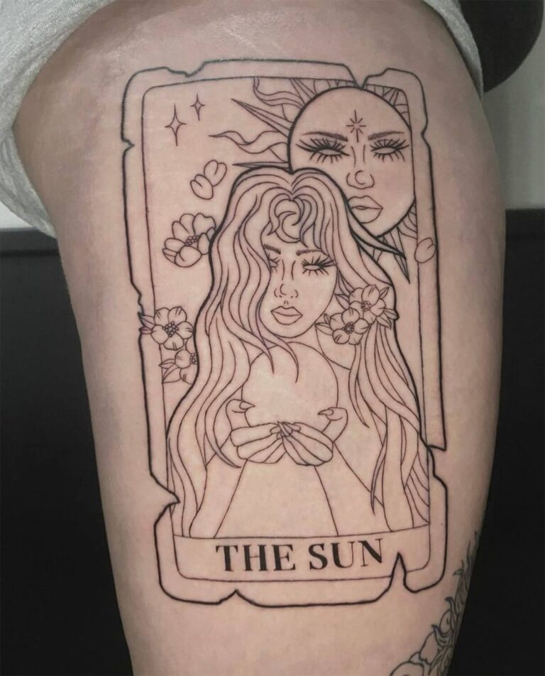 Fineline tattoo of a tarot card with a woman and sun