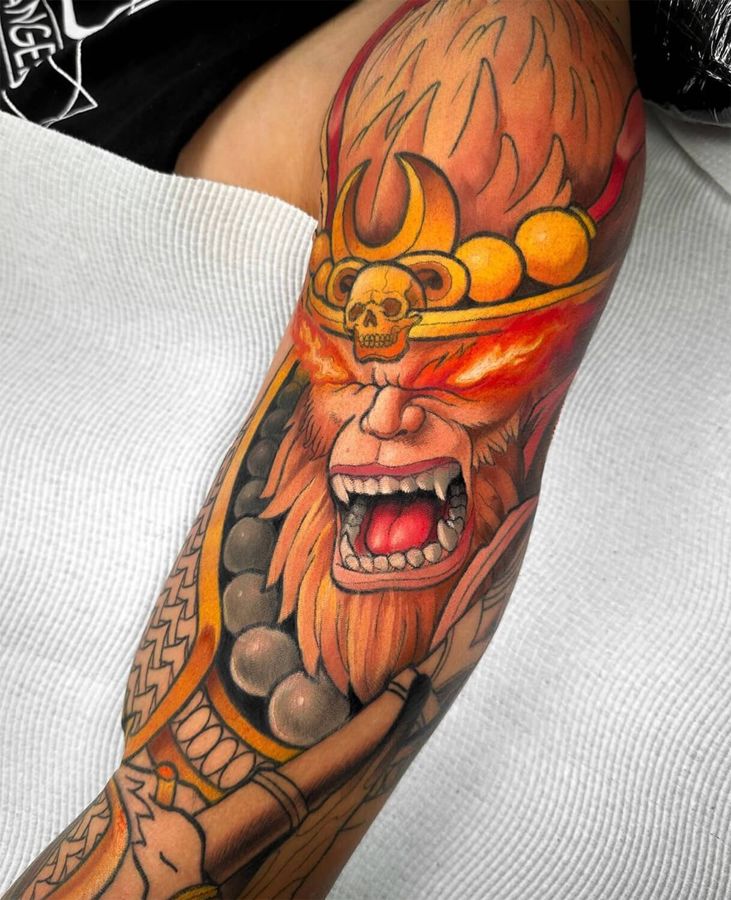 Neotraditional arm sleeve tattoo of a monkey king