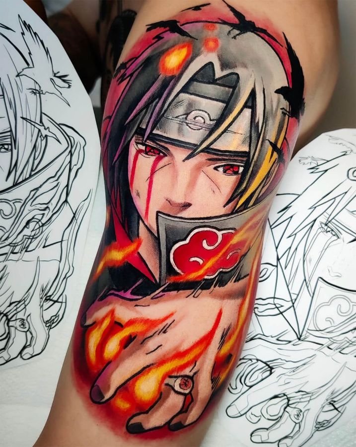 Full color anime tattoo on the upper arm depicting Itachi from Naruto