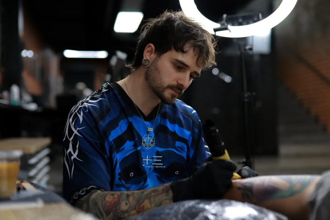Enrico Bigi working on a tattoo at Victims of Ink, South Yarra