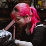 Milli tattooing at Victims of Ink in South Yarra, Melbourne