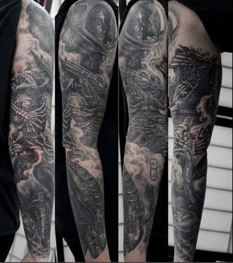 Black and grey space-themed tattoo sleeve with a helmeted figure, mechanical, alien elements.