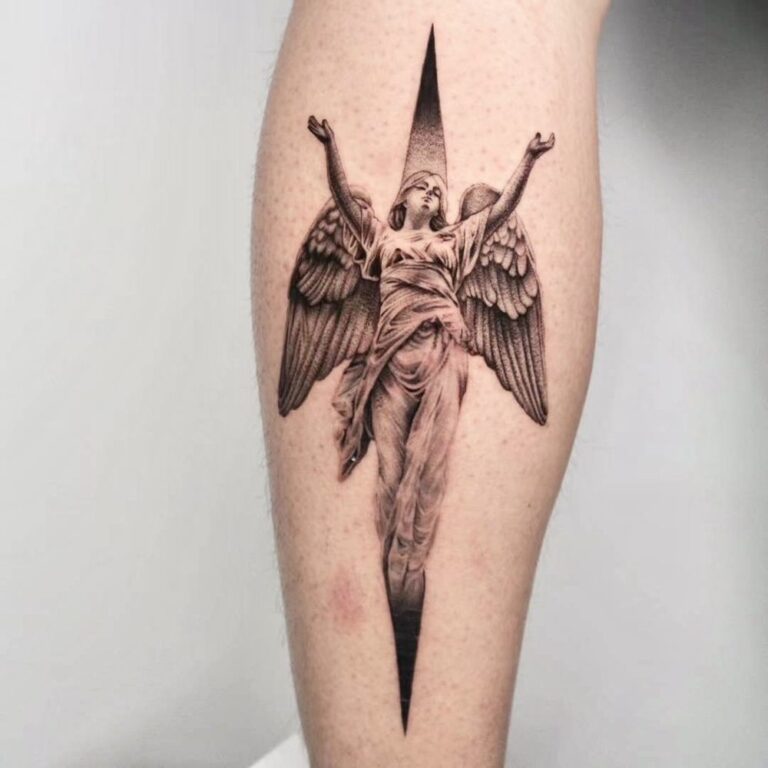 Winged figure with fine shading and a pointed geometric frame on a forearm by Woody