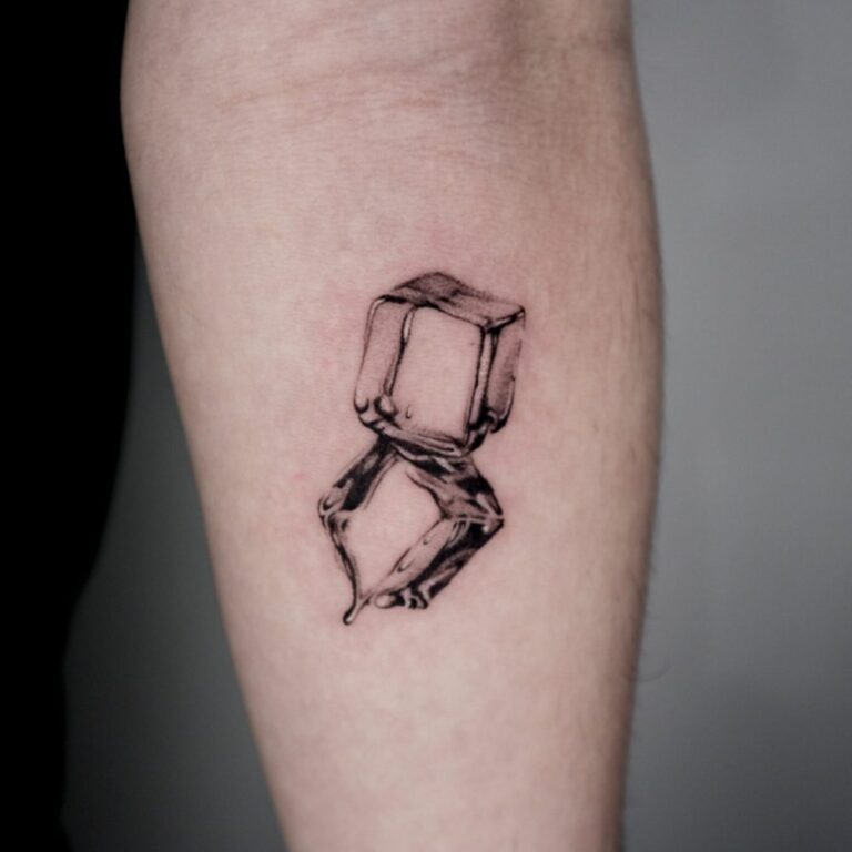 Fine line tattoo of an open ring box on an arm by Woody